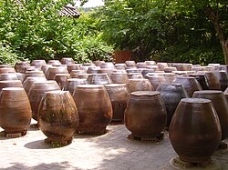 Empty traditional jars (onggi, 옹기), used for storing kimchi, gochujang, doenjang, soy sauce and other pickled banchan (side dishes)
