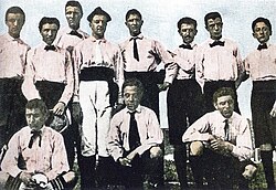The founding team of Juventus in 1899, wearing the pink-and-black kit