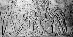 Shasu spies shown being beaten by the Egyptians.