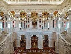 The extravagant design of the Great Hall is an example of Beaux-Arts architecture.