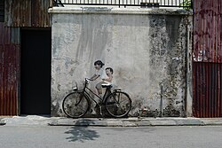 "Little Children on a Bicycle" mural on Armenian Street, George Town, Penang, by Lithuanian artist Ernest Zacharevic