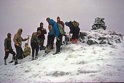 Edinburgh University Mountaineering Club at the cairn on Ciste Dhubh, 1964