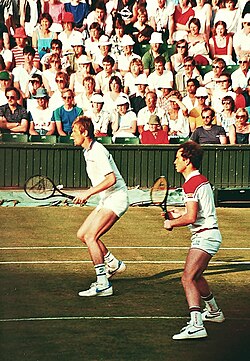 McEnroe with Fleming playing as a doubles team at Wimbledon in the 1980s