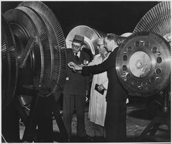 Belgian electrical engineers inspecting the rotor of a 40,000 kilowatt turbine of the General Electric Company in New York City