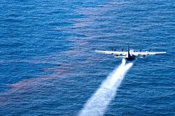 A U.S. Air Force Reserve plane sprays Corexit dispersant over the Deepwater Horizon oil spill in the Gulf of Mexico.