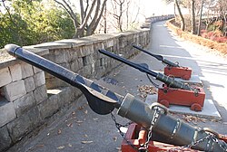 Three of the large Korean artillery, Chongtong in the Jinju National Museum. These cannons were made in the mid 16th century. The closest is a "Cheonja chongtong"(천자총통, 天字銃筒), the second is a "Jija chongtong"(지자총통, 地字銃筒), and the third is a "Hyeonja chongtong"(현자총통, 玄字銃筒).