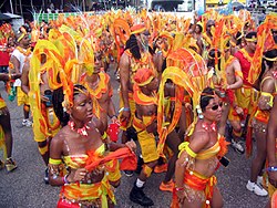 Masqueraders parading during Carnival