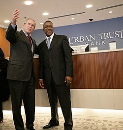 BET founder Robert L. Johnson with former US President George W. Bush