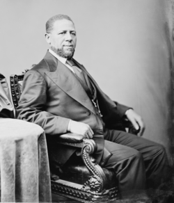 Hiram Revels, the first African American US senator, elected in 1870 from Mississippi. One other Black US senator, Blanche K. Bruce, was elected from the same state in 1874.