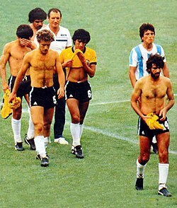 Argentina players leaving the field after being eliminated by Brazil at the 1982 FIFA World Cup.