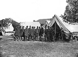 Custer (extreme right) with President Lincoln, General McClellan and other officers after the Battle of Antietam, 1862