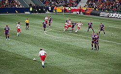 A direct free kick being taken by RB Salzburg