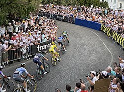 Mads Pedersen, Tadej Pogačar and eventual stage winner Mathieu van der Poel on the Montmartre climb on stage 21