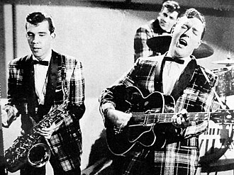 Bill Haley and his Comets performing in the 1954 Universal International film Round Up of Rhythm