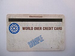 Front side of the first Magnetic Stripe plastic credit card. Note that the narrow magnetic stripe is on the front of the card. It was later switched to the back side.