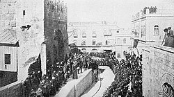 The formal transfer of Jerusalem to British rule, with a "native priest" reading the proclamation from the steps of the Tower of David