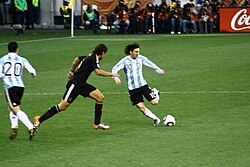 Rodríguez (furthest left) in action against Germany at the 2010 World Cup