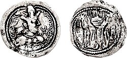 Early Alchon Huns coin based on the coin design of Shapur II, adding the Alchon Tamgha symbol and Alchono (αλχοννο) in Bactrian script on the obverse. Dated 400–440.[60]