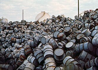 A mound of oil drums near the Baton Rouge ExxonMobil Refinery along the Mississippi River in December 1972.