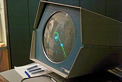 Spacewar! (1962), an early mainframe computer game, pictured running on a PDP-1 computer