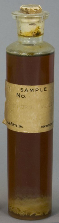 A bottle of unrefined whale oil