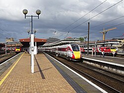 Three generations of East Coast Main Line trains at York. A Class 43 InterCity 125 (left) with a Class 800 Azuma (centre) and a InterCity 225 (right)