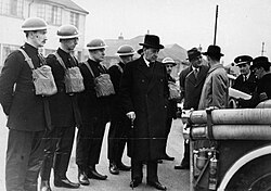 Home Secretary John Anderson with members of the Auxiliary Fire Service in Southampton in February 1940