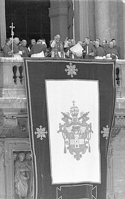 Pope Paul VI appears on the central loggia after his election on 21 June 1963.