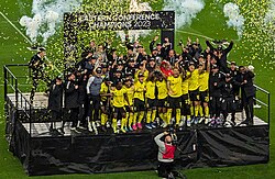 Crew players celebrate winning the Eastern Conference final in the 2023 MLS Cup Playoffs.