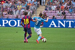 Alba taking on Jorginho of Napoli in 2014