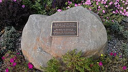 This marker, just outside the Student Union building, marks the original location of the one-room schoolhouse.