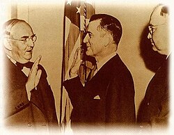 Stennis being sworn into the U.S. Senate by Arthur Vandenburg, 1947. James Eastland, Mississippi's other Senator, stands behind Stennis.