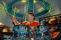 Carl Palmer with rim-mounted tom mics.