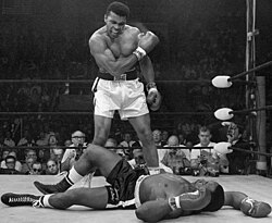 Ali standing over Sonny Liston during their second fight