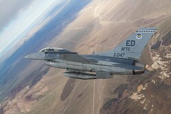 An F-16D assigned to the 416th Flight Test Squadron, 412th Test Wing, Air Force Test Center, flies over the Mojave Desert near Edwards AFB, California