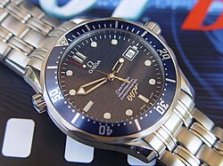 The Omega Seamaster, a deep diving watch. The second crown (at 10 o'clock) is a helium release valve to allow helium out of the watch after practicing saturation diving at great depths. The watch is similar to that shown in recent James Bond films, in which this valve is transformed into improbable hidden gadgets.