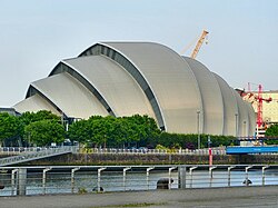The design of the SEC Armadillo is inspired by Glasgow's shipbuilding history, with flat sheet material cladded to framed hulls[212]