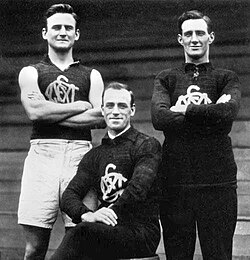 South Melbourne's ruck combination of the 1920s, left to right: Mark Tandy, Fred Fleiter and Roy Cazaly. Fleiter coined the phrase "Up there, Cazaly!" as a signal for Cazaly to leap for the ball. It entered popular idiom as a phrase of encouragement, and was used as a battle cry by Australian soldiers during World War II. It remains well known through Mike Brady's 1979 Australian football anthem of the same name.