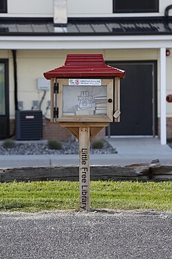 A Pizza Hut-themed Little Free Library in front of a Pizza Hut in Gillette, Wyoming