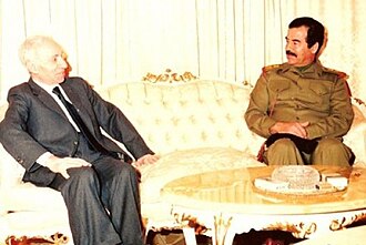 Saddam Hussein (right) talking with Michel Aflaq (left) in 1988