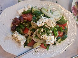 A Greek salad, with feta and olives