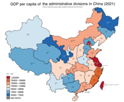GDP per capita in 2021. The disparity in terms of wealth runs in the east–west direction rather than the north–south direction. However, the southeast coast is still wealthier than the northeast coast in per capita terms