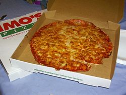A pizza in an Imo's Pizza box