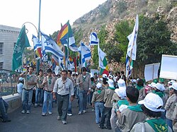 Israeli Druze Scouts march to Jethro's tomb. Today, thousands of Israeli Druze belong to 'Druze Zionist' movements.[387]