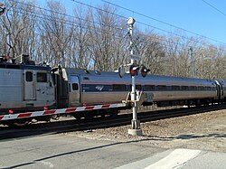 A Northeast Regional train crosses Miner Lane in Waterford, the site of a fatal accident in 2005