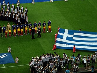 Greece players singing the Greece national anthem in Euro 2012 opening match against the hosts Poland (1–1)