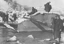 Bosnian Muslim soldiers of the 16th Muslim Brigade cross the Drinjača river during the Kugelblitz / Schneesturm operations againts Axis forces, December 1943