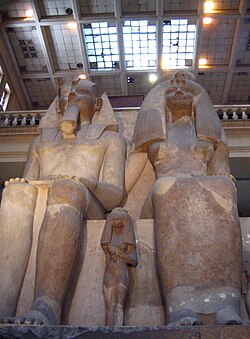 A colossal statue of Amenhotep III, Queen Tiye and Princess Henuttaneb. Egyptian Museum in Cairo, 2008