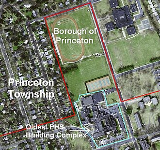 This image of PHS from above (with old municipal boundaries pre-dating the January 1, 2013, consolidation of Princeton highlighted) predates the 2000s construction. The building complex to the right of the athletic fields and track is Princeton Middle School, also pre-construction.