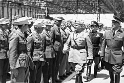 Mussolini reviews a contingent of German airmen on 25 June 1942